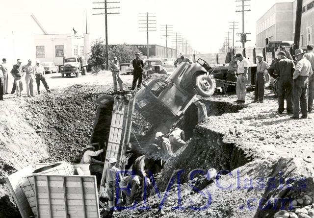 1949Ford,CalgaryAB,Truckrolledintoexcavationin1960s,photoStuPatersonx.jpg