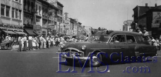 1952HenneyPackard,PerthAmboyNJ,menstandingonrearbumper,photoSteveLoftin.jpg
