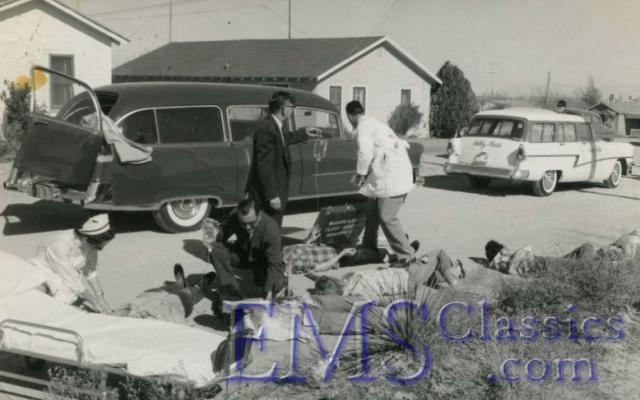 1954MillerCadillac1956Mercury,mockdisaster.jpg