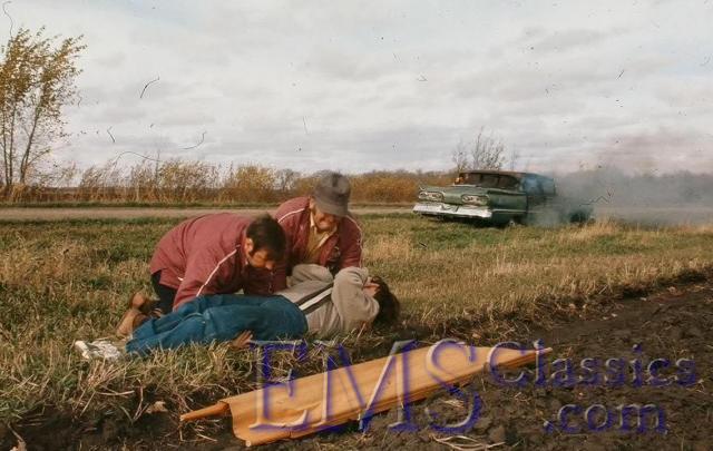 1978TreherneEMSVolunteersPreparingFortTransport,phBLatimer.jpg
